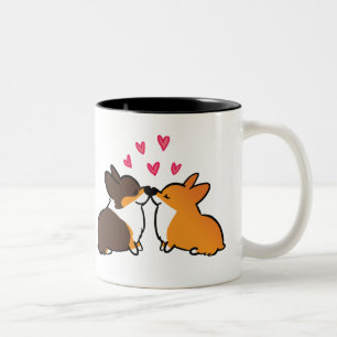 Baisers des baisers de corgi de la tasse   de