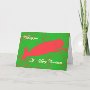 baleine rouge sur la carte de voeux de noël du mer