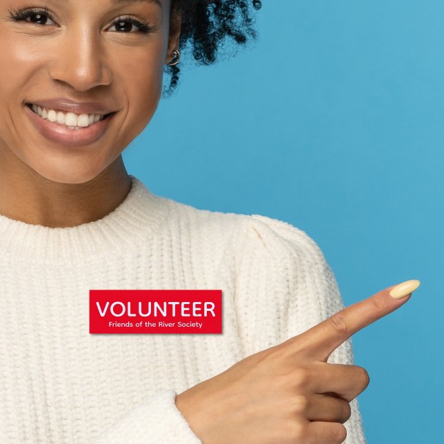 Balise de nom Red Volunteer Badge (Woman in ivory sweater wearing this customizable volunteer name tag badge in red and white.)