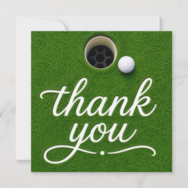 Balle de golf à côté du trou merci sur gazon vert (Devant)