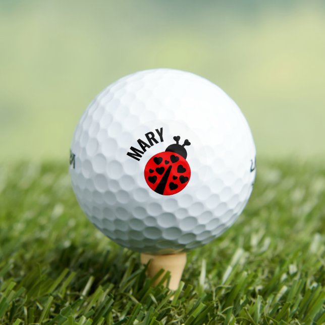 Balle de golf coccinelle rouge et noire (T-shirt Insitu)