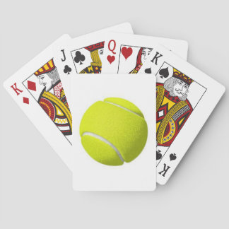 Balle de tennis sur un paquet de cartes de jeu