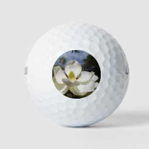Balles De Golf Fleur de Magnolia blanche et une abeille sur le ba
