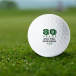 Balles De Golf Funny Golf Balls 80e fête d'anniversaire Monogramm<br><div class="desc">Votre golfeur qui a quatre-vingts ans va se faire rire de ces balles de golf personnalisées. Dispose d'un design avec le texte "80 ans et toujours en mouvement". (Vous pouvez modifier le nombre en n'importe quelle année et la couleur à votre choix.) Personnalisez avec des initiales monogrammées, le nom ou...</div>