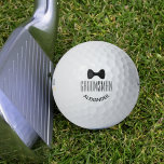 Balles De Golf Groomsman Wedding Favoriser Fun Black Bow Cravate<br><div class="desc">Ces balles de golf amusantes sont la faveur de mariage parfaite pour vos groomsmen! Elles présentent un design simple avec une cravate à arc noir et le mot "Groomsman" avec un espace pour son nom. Joli ajout à un sac à bagages mariage, et la meilleure façon de le remercier d'avoir...</div>