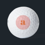 Balles De Golf Joli Pastel rose orange Monogramme rétro Lettres<br><div class="desc">Ces boules de golf élégantes présentent votre monogramme en corail sur un arrière - plan rose pastel en lettrage rétro. Super idée cadeau !</div>