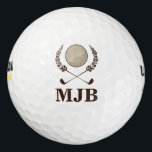 Balles De Golf Monogramme Crest<br><div class="desc">Un design élégant et distingué,  avec des crêtes de couronne de laurier,  des clubs de golf traversant et une balle de golf dans le centre. Personnalisez ces balles de golf avec des initiales monographiques. Ceux-ci font de grands cadeaux pour un golfeur passionné.</div>
