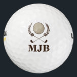 Balles De Golf Monogramme Crest<br><div class="desc">Un design élégant et distingué,  avec des crêtes de couronne de laurier,  des clubs de golf traversant et une balle de golf dans le centre. Personnalisez ces balles de golf avec des initiales monographiques. Ceux-ci font de grands cadeaux pour un golfeur passionné.</div>