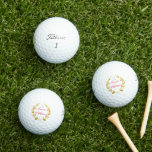 Balles De Golf Titleist Pro V1 Golf Balls - Custom Name Golf Ball<br><div class="desc">L'exemple de nom personnalisé est montré avec une couronne de laurier or et des clubs de golf imprimé,  montré est le Titleist Pro V1 Golf Balls. Trois Pack de texte couleur rouge Customisez ces boules et changez le nom de l'échantillon à votre nom.</div>