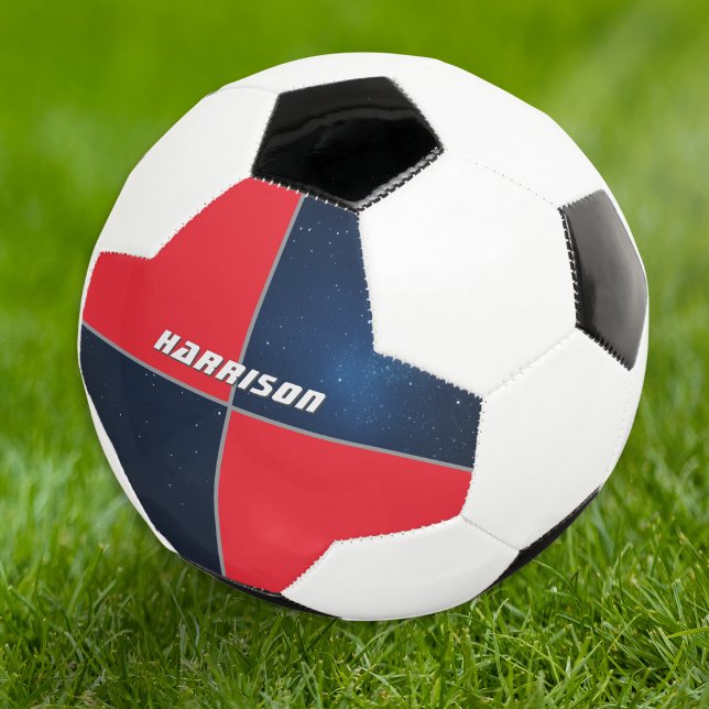 Ballon De Foot Espace Galaxie personnalisé (A soccer ball with bright red and blue night sky sections, and customizable name in modern lettering)