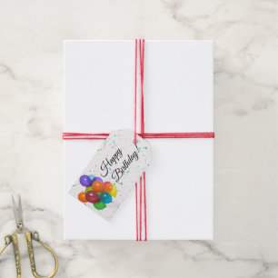 Ballons et étiquettes colorés de cadeau de parti