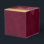 Ballotins Bourgogne profonde et or<br><div class="desc">Ballotin vintage éblouissant aux accents de prune bordeaux et d'or.</div>