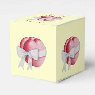 Ballotins cœurs rouges noués avec des rubans blancs pour mar