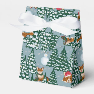 Ballotins Corgis décorent l'arbre de Noël en bleu de la forê