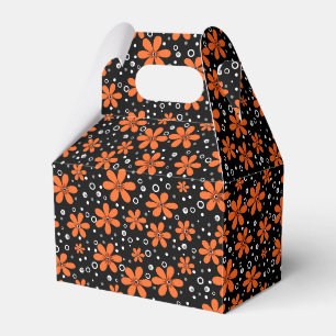 Ballotins Fleurs orange vif sur un arrière - plan noir avec