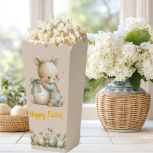 Ballotins Lapin bébé mignon en pyjama avec un œuf de Pâques