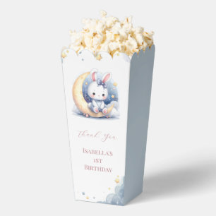 Ballotins mignon lapin assis sur la lune