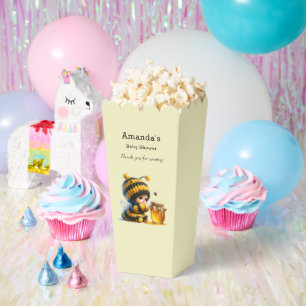 Ballotins Mignonne fille en costume d'abeille avec Baby show