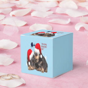 Ballotins Noël blanc de chiot avec le traîneau du Père Noël