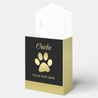 Paw chien brillant or sur arrière - plan noir