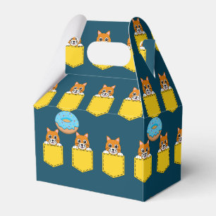 Ballotins Un chat qui regarde et un donut bleu