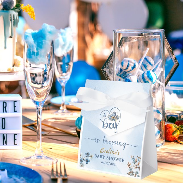 Ballotins Un garçon brasse du thé à la fête Baby shower garç (blue teapot filled with pastel florals, charming blueberries, golden branches, eucalyptus sprigs, )