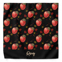Pommes rouges et feuilles sur noir