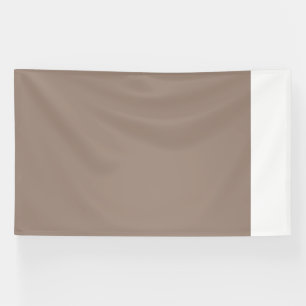 Banderoles un mur marron avec une horloge dessus