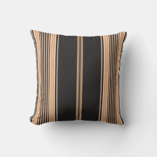 Bandes noires, brunes et blanches sur un Coussin