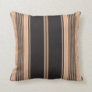 Bandes noires, brunes et blanches sur un Coussin