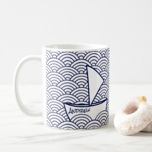 Bateau sur la tasse de vagues
