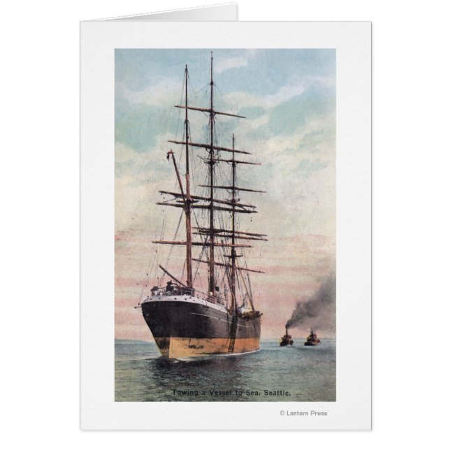 Bateaux remorqueurs remorquant un navire en mer (Devant)