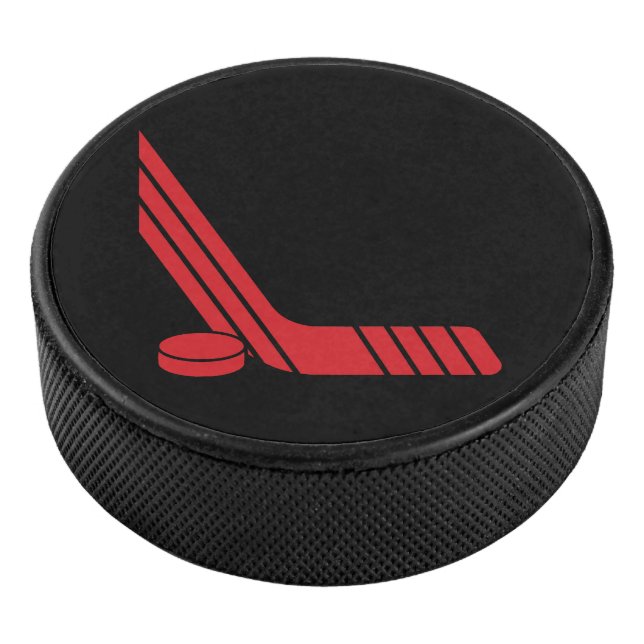 Bâton de hockey rouge minimal et palet (3/4/2016 12:00:00 AM)