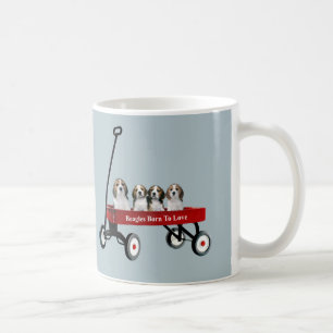 Beagles dans la tasse de chariot
