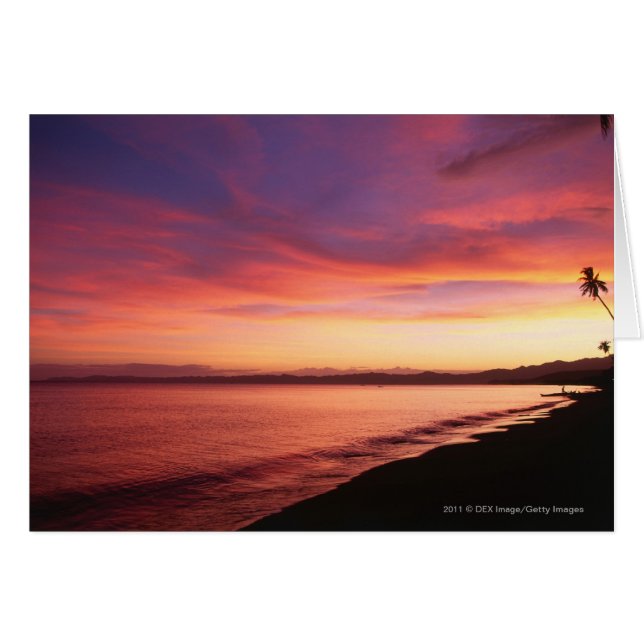 Beau coucher de soleil sur la plage (Devant horizontal)