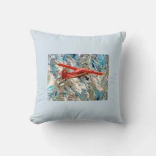 Beau coussin d'avion rouge