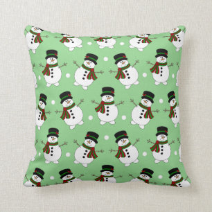 Beau coussin vert de bonhomme de neige