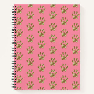 Beau motif de patte sur cahier rose