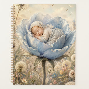 Bébé endormi dans une fleur bleue