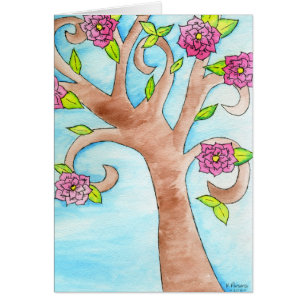 Bel arbre avec les fleurs roses