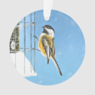 Bickadee sur la peinture d'alimentation - Oiseaux