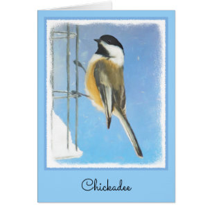 Bickadee sur la peinture d'alimentation - Oiseaux