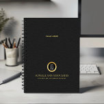 Black Round Gold Nom logo Entreprise professionnel<br><div class="desc">Restez organisé et élevez votre image professionnelle avec notre planificateur Spiral personnalisé, avec un design raffiné en cuir noir qui allie sophistication et fonctionnalité. Un espace carré personnalisable sur la couverture vous permet d'afficher en évidence votre logo d'entreprise sur une texture dorée tandis que deux lignes supplémentaires de texte modifiable...</div>