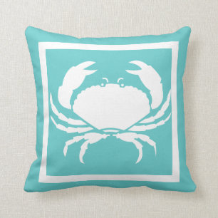 BLANC DE CRABE sur coussin bleu turquoise