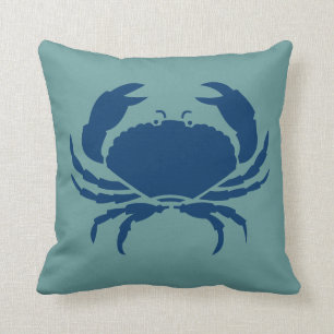 BLANC DE CRABE sur coussin bleu turquoise foncé