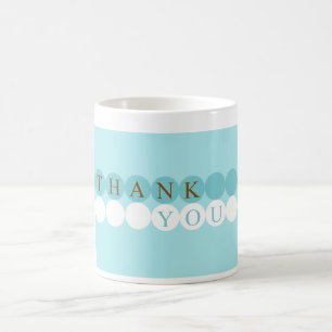 Bleu et blanc entoure la tasse de Merci
