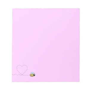 Bloc-note Abeille positive heureuse dans le rose de bande