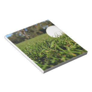 Bloc-note Boule de golf sur le bloc - notes de cours