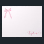 Bloc-note Coquette aquarelle Pink Bow ruban personnalisé<br><div class="desc">Ajoutez une touche de douceur à vos notes quotidiennes grâce à ce bloc-notes personnalisé doté d'un arc rose et d'un ruban d'aquarelle souple. Parfait pour ajouter du charme à vos fournitures de bureau, ce bloc-notes personnalisé peut être personnalisé avec votre nom ou un message spécial, ce qui en fait un...</div>