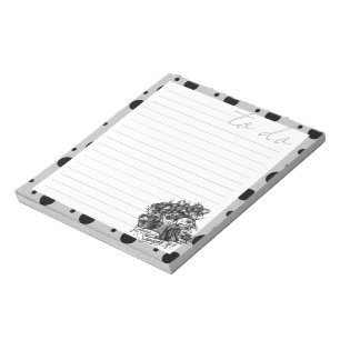 Bloc-note CRAINTE À LA NUIT : L'art du tatouage en Guinée